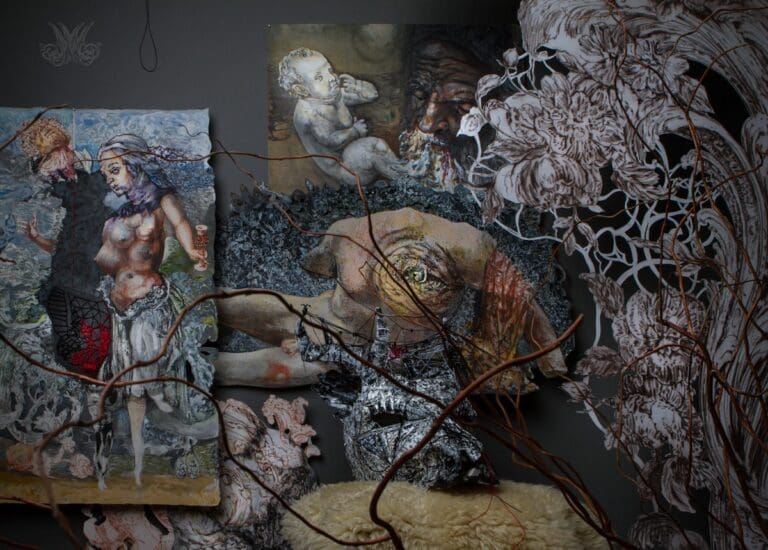 Studio photograph of various mythological themes in painting and drawing and also showing a mask of a stag on a sheepskin.